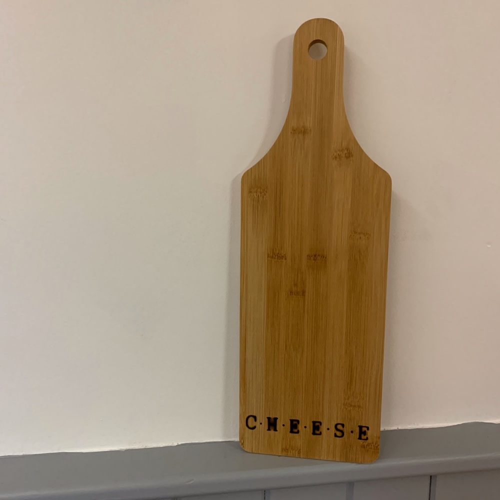 Paddle style cheese board
